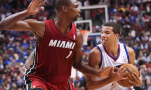 Philadelphia 76ers guard Michael Carter-Williams and Miami Heat's Chris Bosh