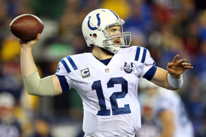 FOXBORO, MA - JANUARY 11: Andrew Luck #12 of the Indianapolis Colts looks to throw a pass against the New England Patriots during the AFC Divisional Playoff game at Gillette Stadium on January 11, 2014 in Foxboro, Massachusetts. (Photo by Al Bello/Getty Images)