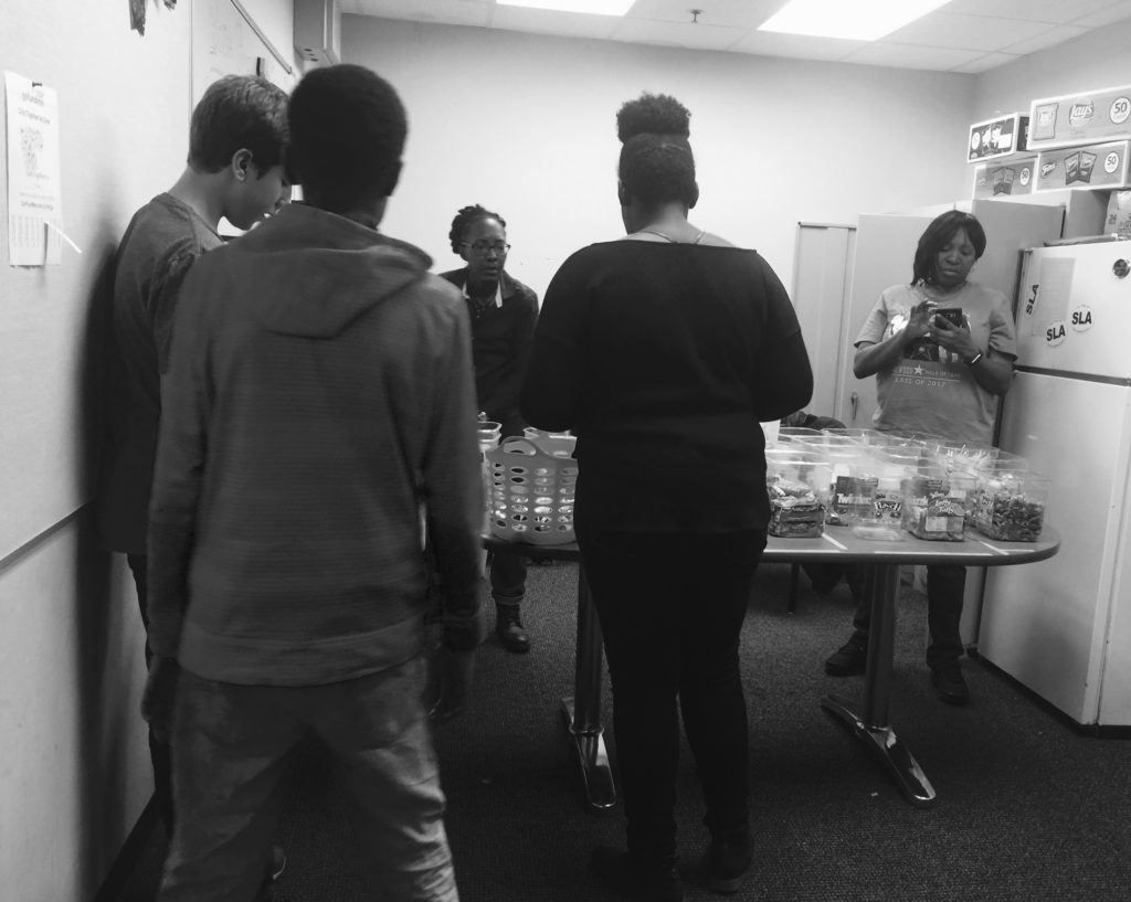 Students line up to purchase soda and snacks at the SLA school store on Friday, January 27th.