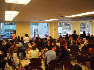 Members of the SLA Community during the small group breakout portion of Monday's meeting. Photo by Sarah Frunzi. 